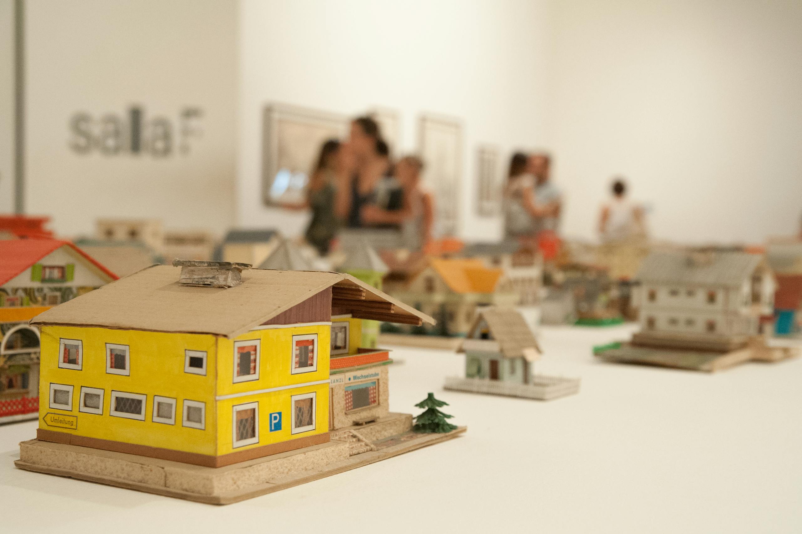 Selective Focus Photography of House Miniature Lot